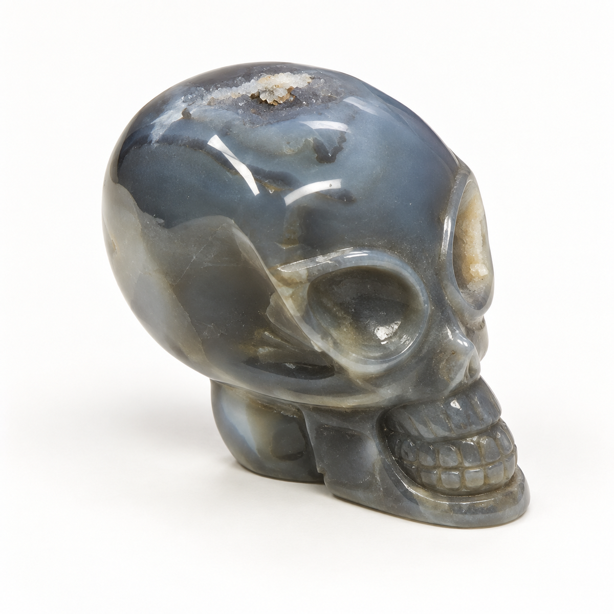 A cosmic alien Chalcedony carved from Earth’s treasures.